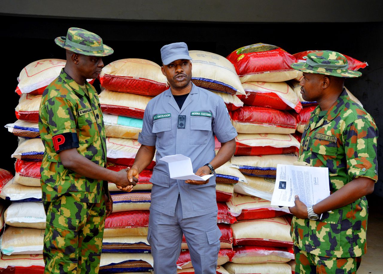 Smuggler crashes into military vehicle in Ogun, loses 55 smuggled bags of rice to Customs